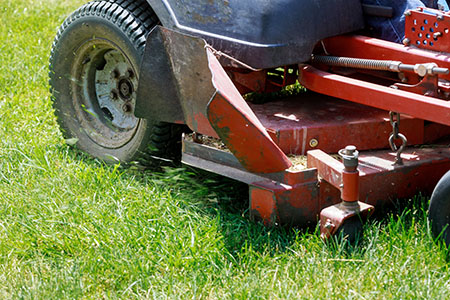 Lawn Mower On Green Grass Mow